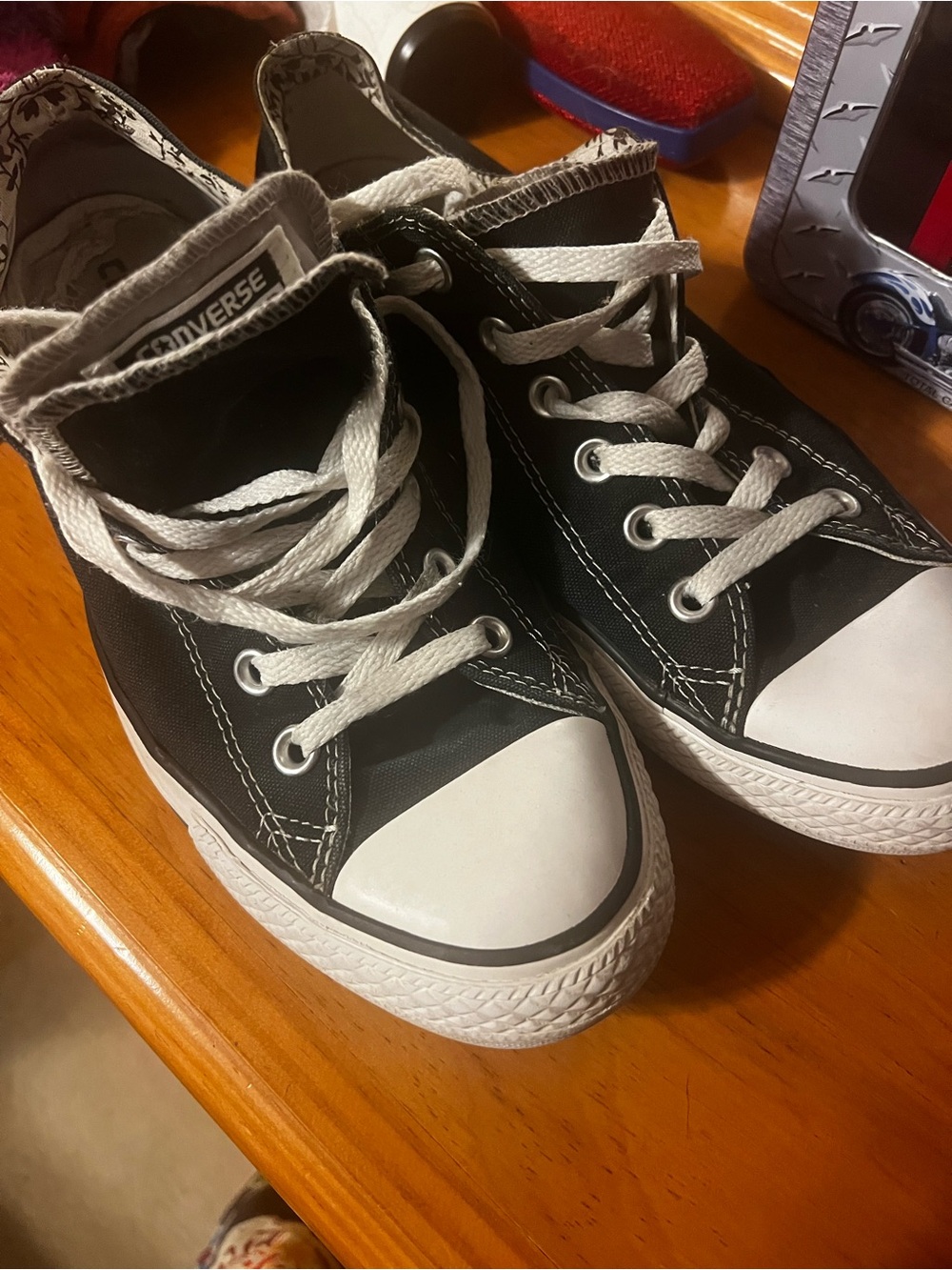 Converse women’s Black and White Low Top Sneakers